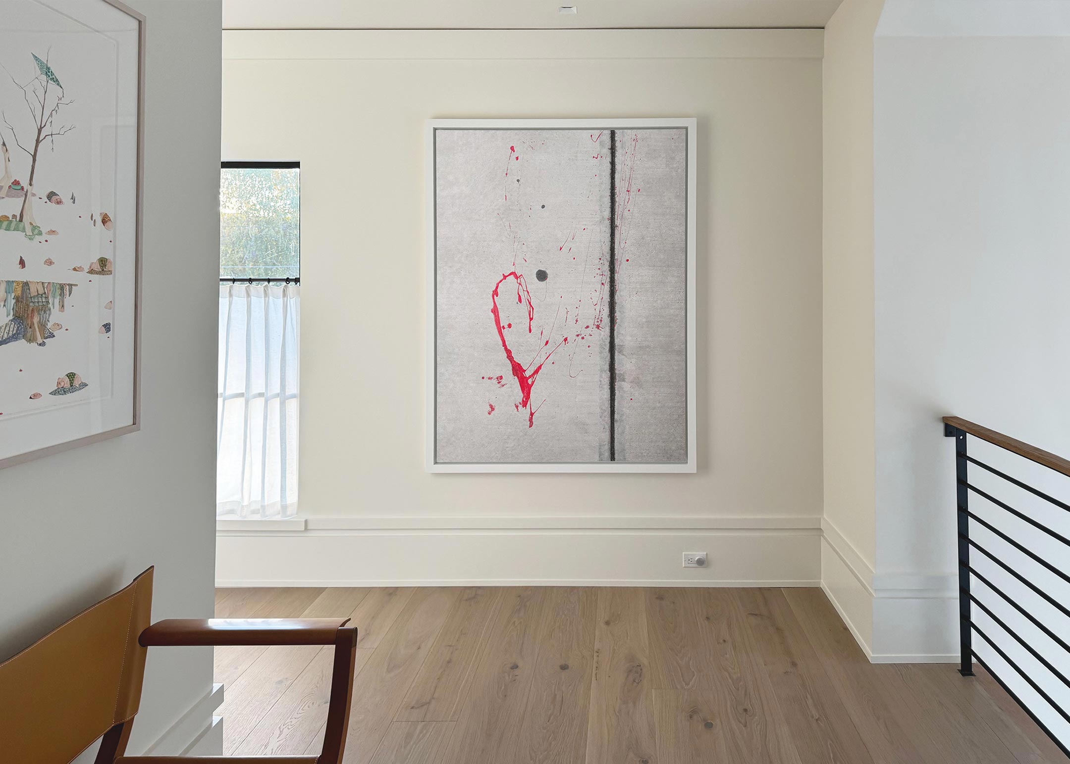 A picture of a very large fine art photograph of the New York City sidewalk hanging on a wall.