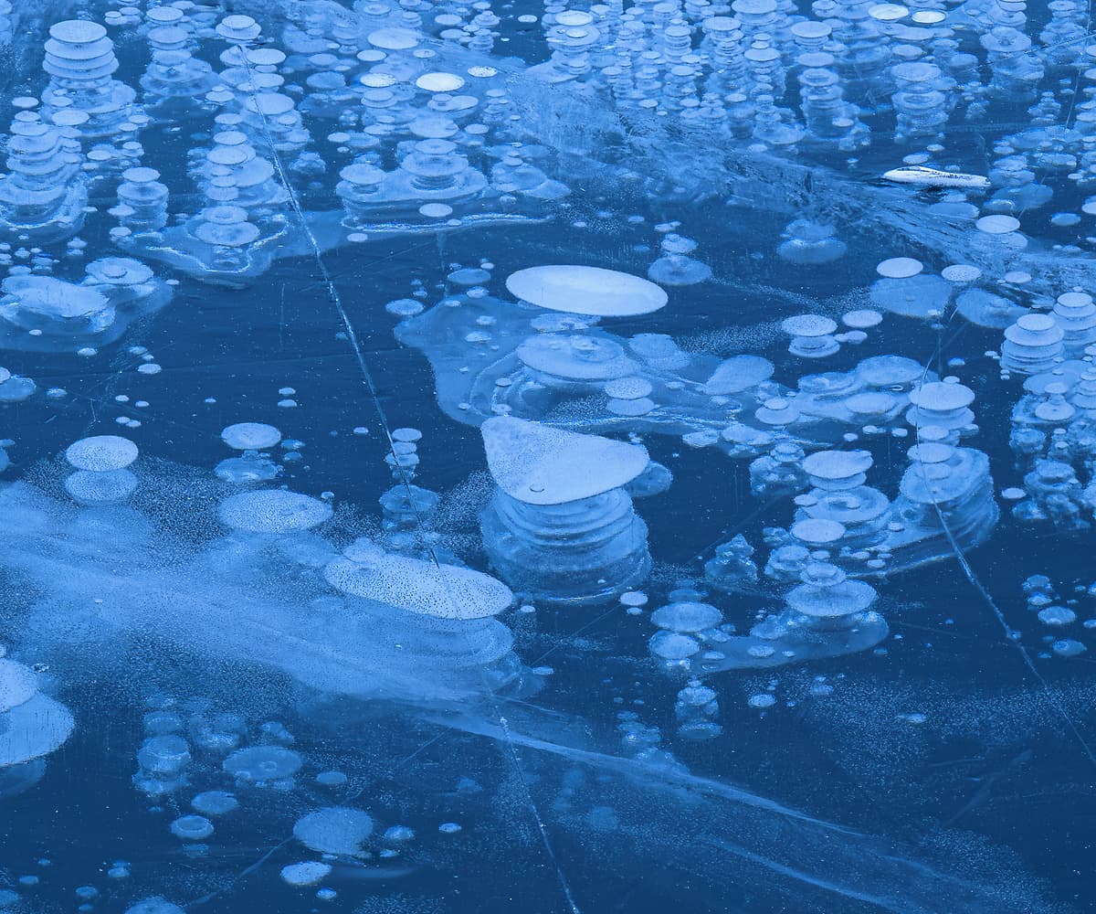 499 megapixels! A very high resolution, large-format landscape photo print of a frozen lake with a mountain range in the background; winter photograph created by Scott Dimond at Abraham Lake in Alberta, Canada.