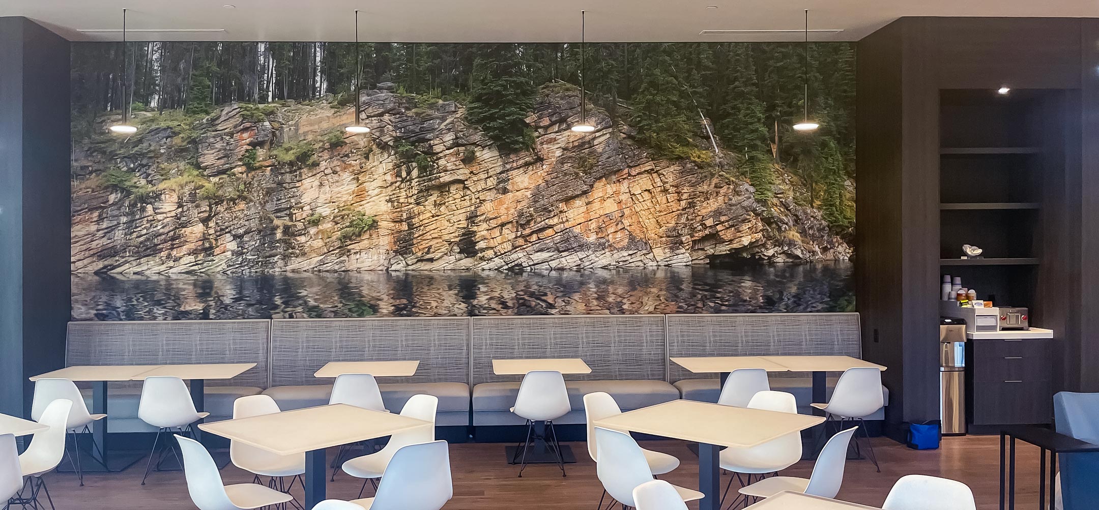 An example of an ultra-high-resolution photograph being licensed for use in an office. The photo is "The Rockface at Horseshoe Lake" by Scott Dimond.