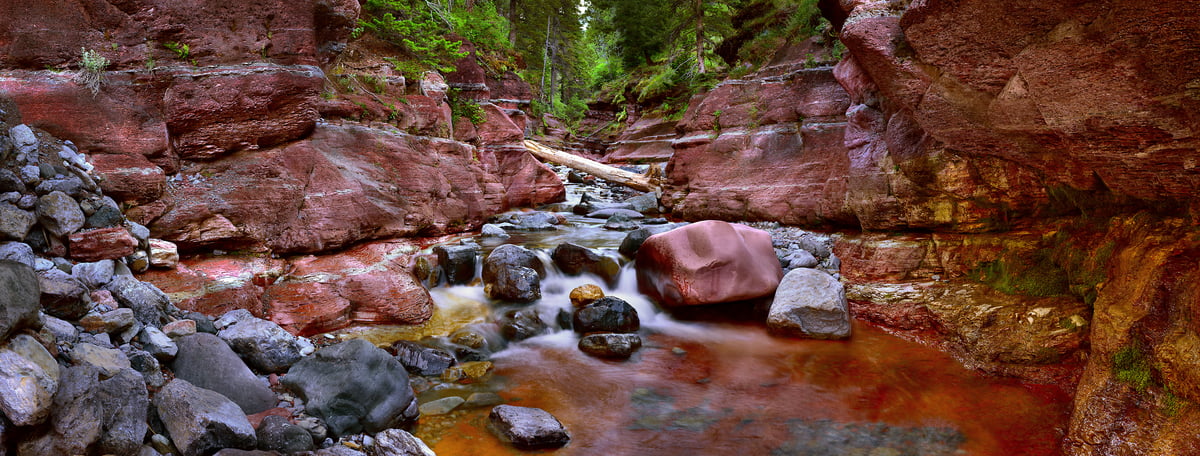 4,741 megapixels! A very high resolution, large-format VAST photo print of a stream, waterfall, and red rocks; fine art nature photo created by Steve Webster in Red Rock Canyon, Waterton Lakes National Park, Alberta Canada.