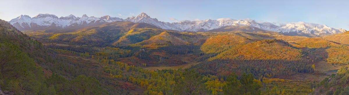1,063 megapixels! A very high resolution, large-format VAST photo print of snow-covered mountains and a valley filled with trees and autumn foliage; gigapixel landscape photograph created by John Freeman in County Rd 5, Ridgway, Colorado.