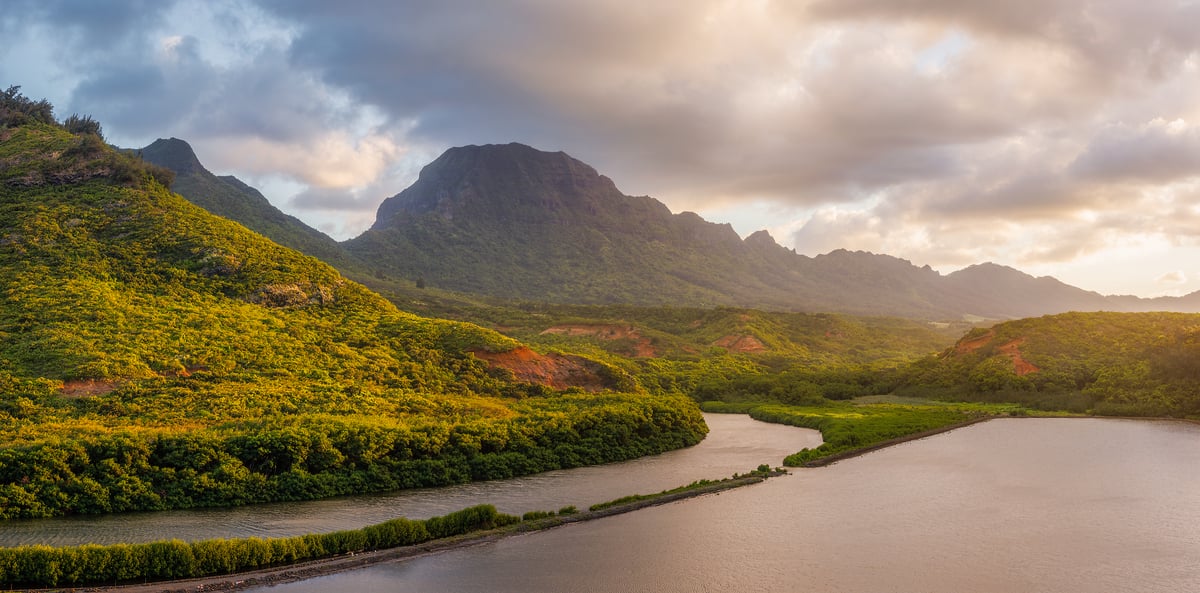 250 megapixels! A very high resolution, large-format VAST photo print of Kauai island in Hawaii at sunset with the Alekoko Fishpond in the foreground and mountains in the background; landscape photograph created by Chris Blake at Menehune Fishpond on Kauai, Hawaii.