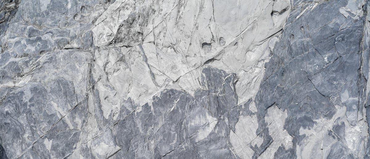 212 megapixels! A very high resolution texture photo of light grey granite rock; gigapixel image available to be licensed and downloaded as a digital file from VAST; photograph created by David Lineton.