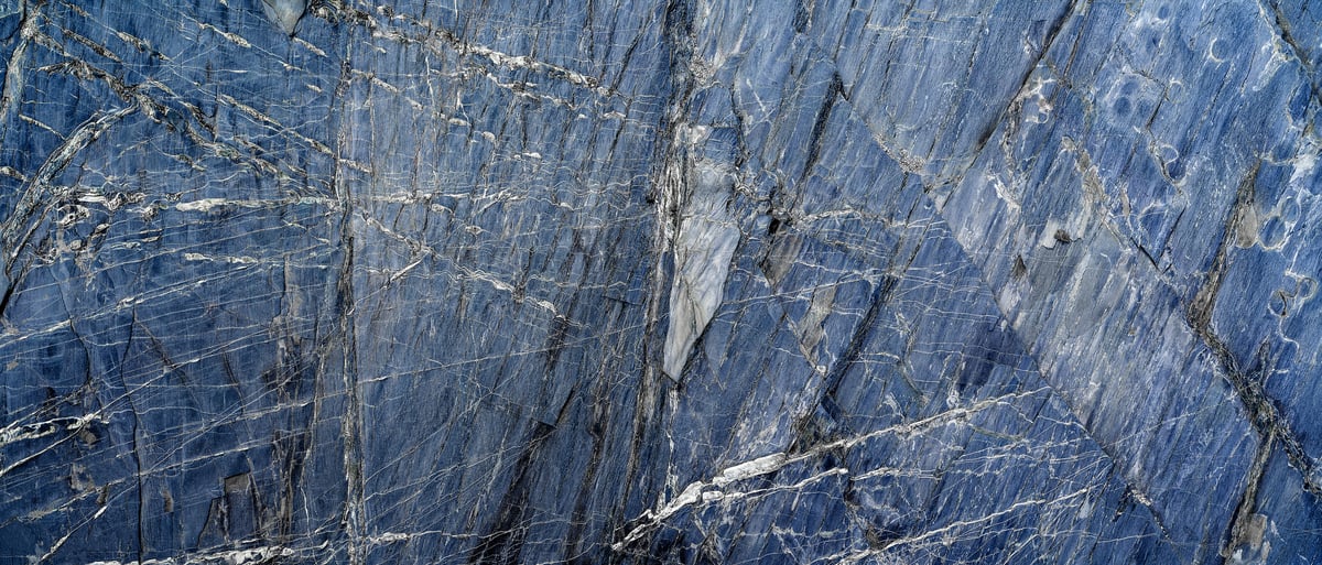 216 megapixels! A very high resolution texture photo of blue granite crystalline textures; gigapixel image available to be licensed and downloaded as a digital file from VAST; photograph created by David Lineton.