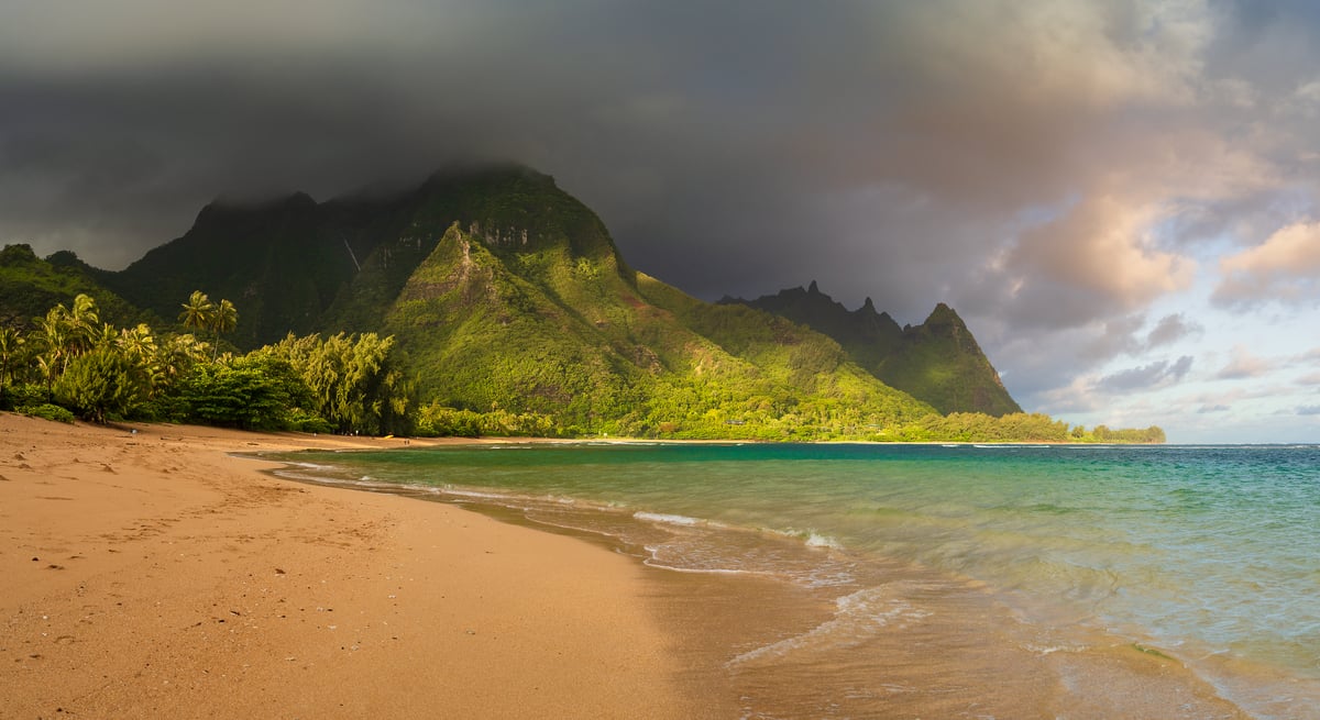 127 megapixels! A very high resolution, large-format VAST photo print of Tunnels Beach at sunrise with beautiful emerald water, verdant mountains, and dramatic clouds; photograph created by Jeff Lewis in Hanalei, Kauai, Hawaii.