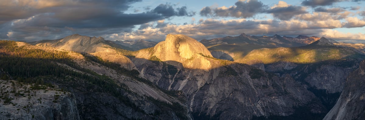 251 megapixels! A very high resolution, large-format VAST photo print of the Yosemite landscape at sunset with Half Dome and other peaks illuminated by the sun; photograph created by Jeff Lewis in Yosemite National Park, California.
